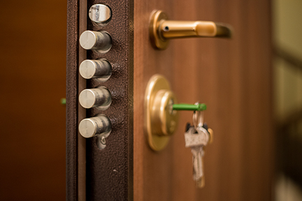 The keys in the lock of the door on the outside safety locked doors security privacy